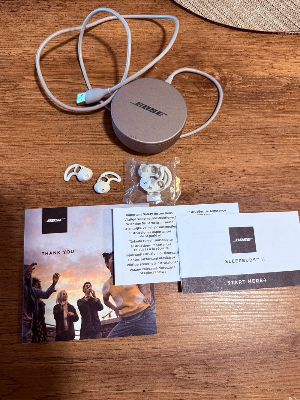 Bose White Earbuds with Silver Round Charging Case